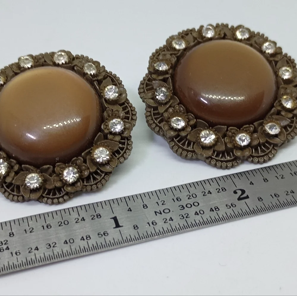 * vintage brown celluloid & moonglow clip on earrings
